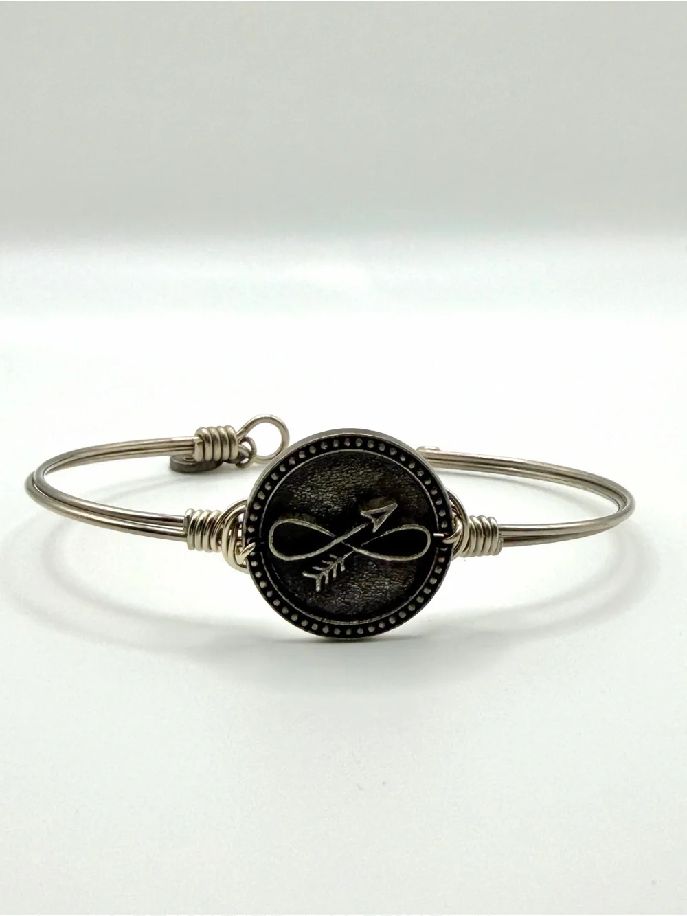 Luca + Danni Infinity Arrow Silver Tone Wire Bangle Bracelet + Pouch